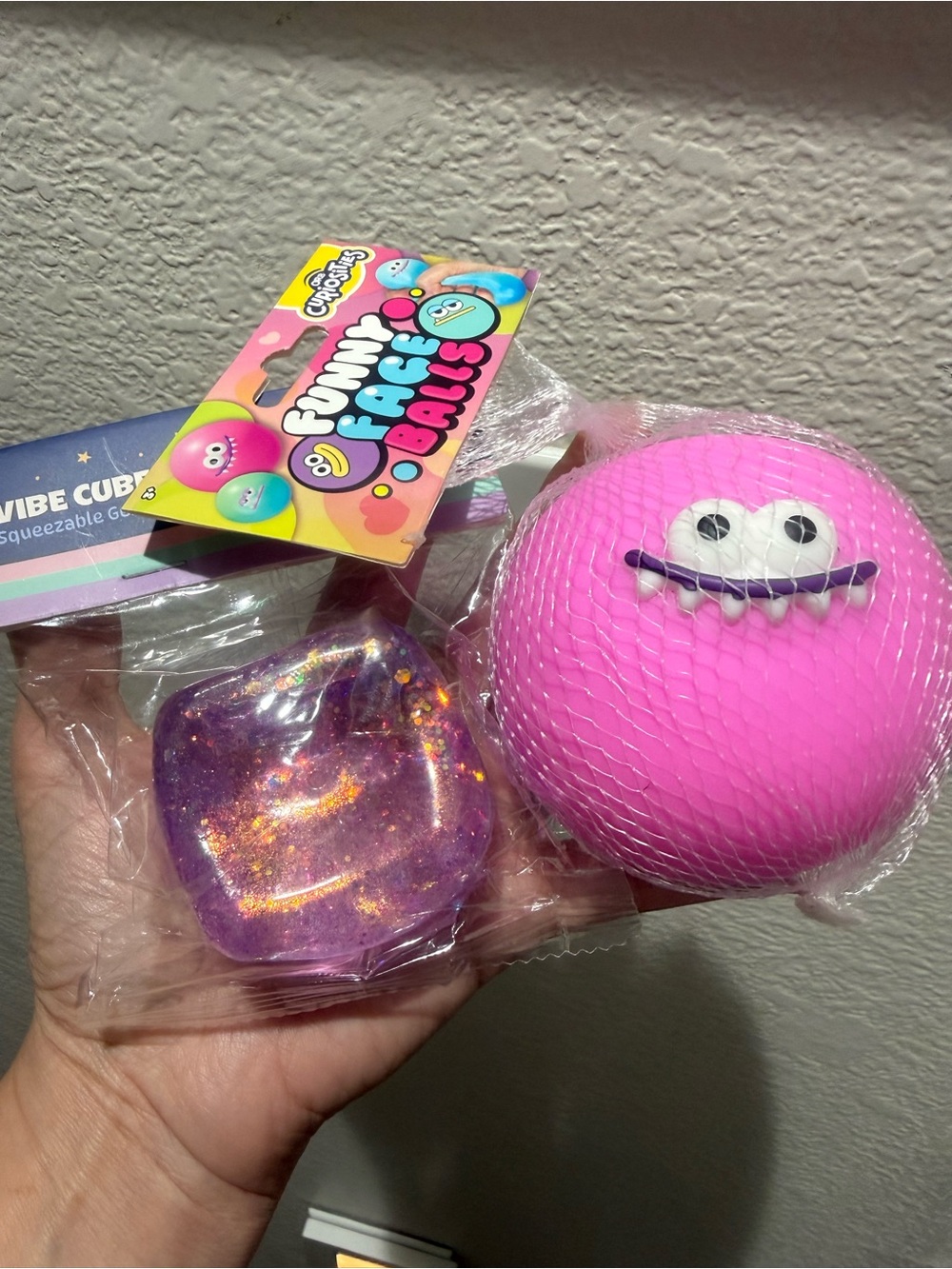 Bundle of 2 squishies. Funny Face Ball & Cube Fidget. Reserved @maddisonmill680
